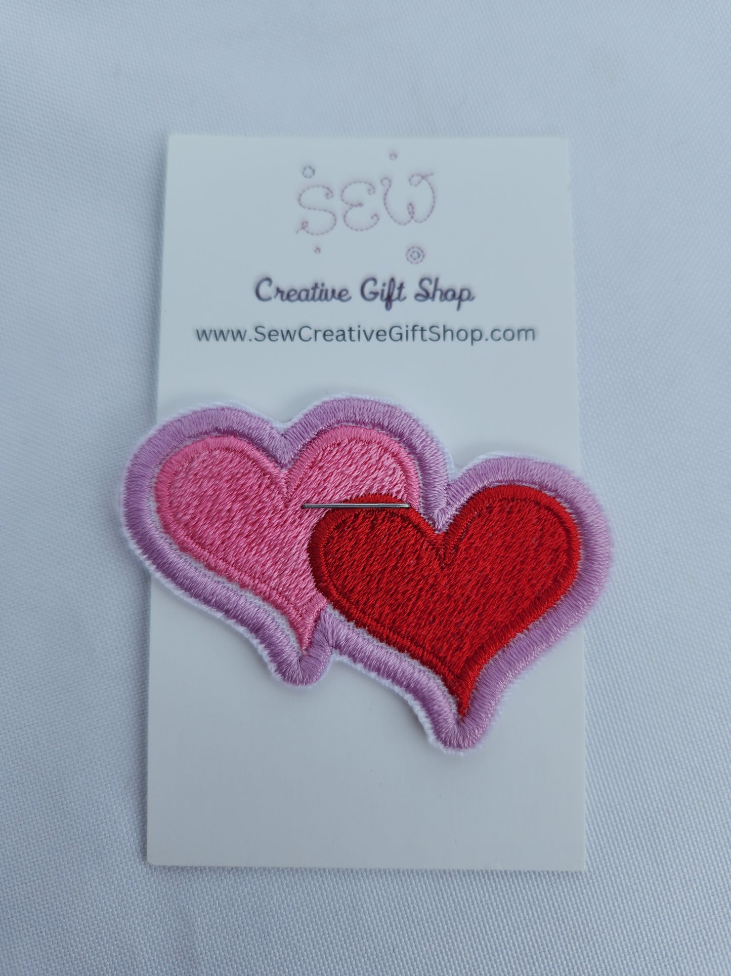 Hearts embroidered iron-on patch