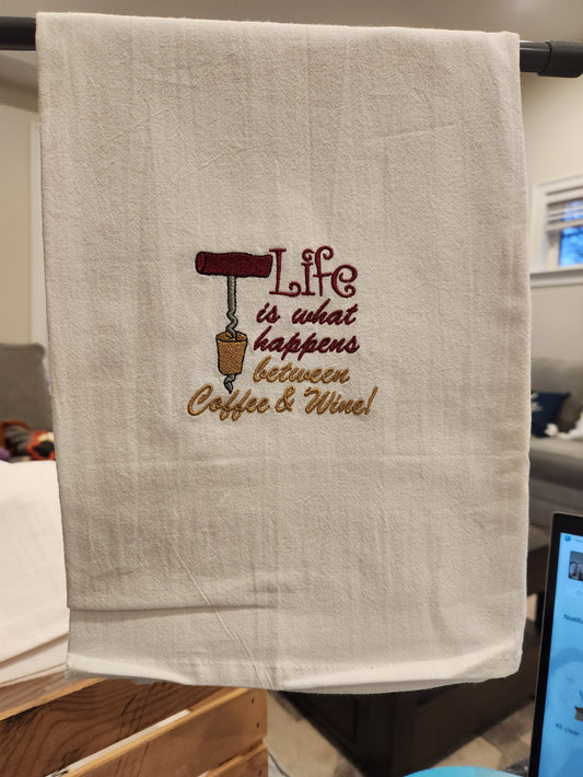 Life is what happens between coffee and wine Embroidered Towel