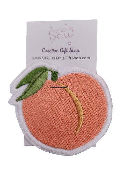 Peach embroidered iron-on patch