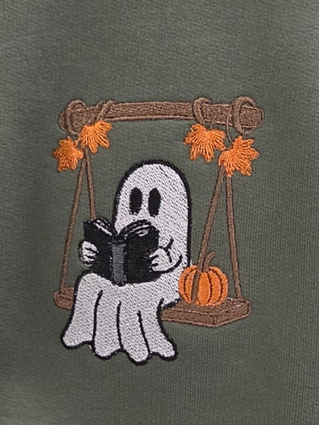 Ghost reading on a tree swing Halloween Embroidered Adult Sweatshirt